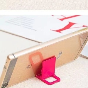 L Shaped Plastic Phone Holder Mini Folding <b>Desktop</b> <b>Stand</b> For Mobile Phone Pink Color PVC Material - Product Image 1