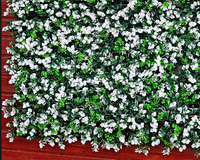 Panneaux de clôture de feuille verte de plante artificielle extérieure de vente chaude haie d'herbe réaliste pour le mur vert de paysage