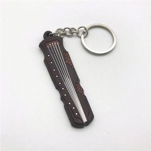 Porte-clés en silicone personnalisé, instrument de musique créatif, guitare, saxophone, piano, comme accessoires pour clés - Product Image 6