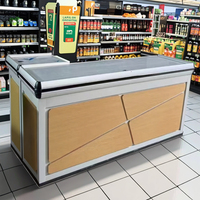 Comptoir de caisse enregistreuse moderne en métal PFT avec étagère d'affichage et éclairage léger pour supermarché