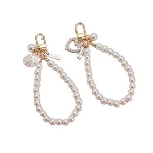 En gros, Porte-clés créatif en perle d'amour, édition coréenne, pendentif de sac rétro en perle de coquillage, accessoires de suspension pour écouteurs - Product Image 1