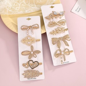 Juego de pinzas para el cabello estilo coreano con diamantes de imitación, pinzas laterales de aleación con perlas, mariposa, lazo, corazón, estrella, para uso diario, hechas en China. - Product Image 3