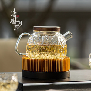 Tetera de vidrio BaiCai con tapa, resistente al calor, pequeña, para calentar té en casa. - Product Image 1