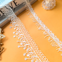 Nouvelle conception de ruban en dentelle brodée en polyester blanc avec pompons, dentelle à paillettes, garniture en dentelle, accessoires de dentelle pour robe de mariée