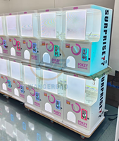 Distributeur automatique de capsules de jouets Gacha intelligent à monnayeur WANGERBAO, OEM/ODM, en anglais, alimentation 110/220V