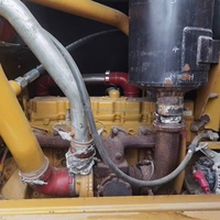 Niveleuse à moteur Cat 140K d'occasion avec