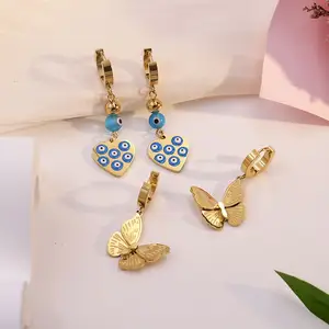 Bijouterie Boucles d'oreilles pendantes plaqué PVD Boucles d'oreilles pendantes fleur de soleil en acier inoxydable doré Vente en gros Dernier design France pour fille Tendance