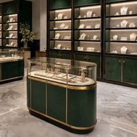 Vitrine de présentation de bijoux de luxe personnalisée avec éclairage LED, construction durable et nettoyage facile pour les magasins de détail