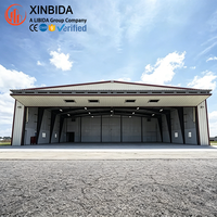 Estructura de Acero Prefabricada con Certificación ISO, Diseño de Estructura de Acero Q235/Q355, Hangar con Puerta Personalizada