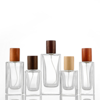 Vente en gros Flacons de parfum de luxe élégants vides rectangulaires à sertir 30ml 35ml 50ml 100ml Flacon en verre transparent avec bouchon en bois