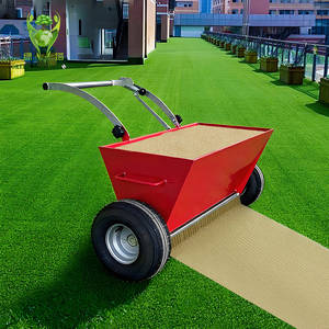 Machine à remplir le gazon artificiel, épandeur de granulés de sable, de caoutchouc et de béton pour travaux de construction - Product Image 1