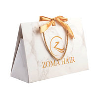 Sac cadeau pliable portable en papier d'art blanc avec logo or personnalisé de luxe pour l'emballage de vêtements et de robes pour femmes