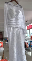 Robe de mariée convertible 2-en-1 avec illusion de perles, manches longues, corsage plissé, jupe de bal détachable et perles scintillantes