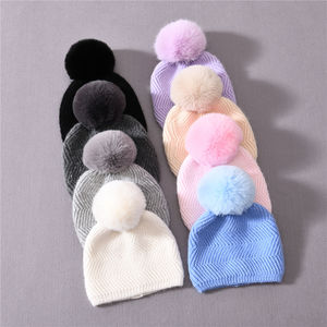 Chapeaux d'hiver pour enfants faits à la main tuques crânes tricotées <span class=keywords><strong>en</strong></span> cachemire doux avec pompon <span class=keywords><strong>en</strong></span> <span class=keywords><strong>fausse</strong></span> <span class=keywords><strong>fourrure</strong></span> amovible mignon bonnet épais et chaud pour le voyage - Product Image 1