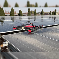 Robot de nettoyage de panneaux solaires intelligent à pulvérisation d'eau, machine de dépoussiérage automatique à brosse remplaçable pour ferme solaire commerciale