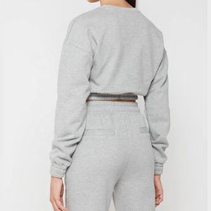 ชุดเซ็ตเสื้อฮู้ดและกางเกงวอร์มผ้าฟลีซสำหรับผู้หญิง สไตล์สตรีทแวร์ฤดูหนาว พร้อมโลโก้สั่งทำ ผ้าฝ้าย 100% - Product Image 4