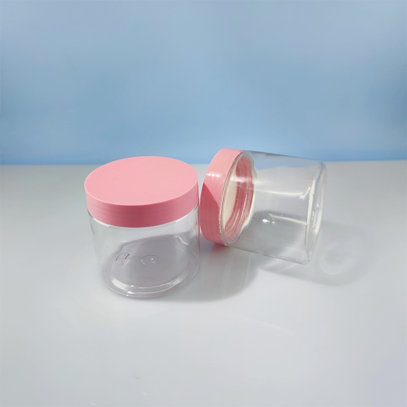 Transparent 68mm bottle with pink lid