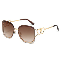 Nouvelles Lunettes de Soleil Élégantes 2026 pour Femme – Monture Sans Cadre, Anti-UV, Verres Métalliques, Branches Design Double Cœur