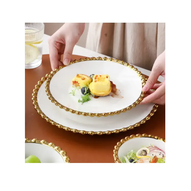 Vente en gros d'assiettes décoratives en céramique or blanc gris avec détails dorés pour la décoration de la maison, la fête, le mariage et la cuisine