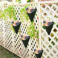 Nouveau pot de fleur en triangle noir non tissé transfrontalier sac suspendu balcon intérieur créatif suspendu mur panier de fleurs pot de plante