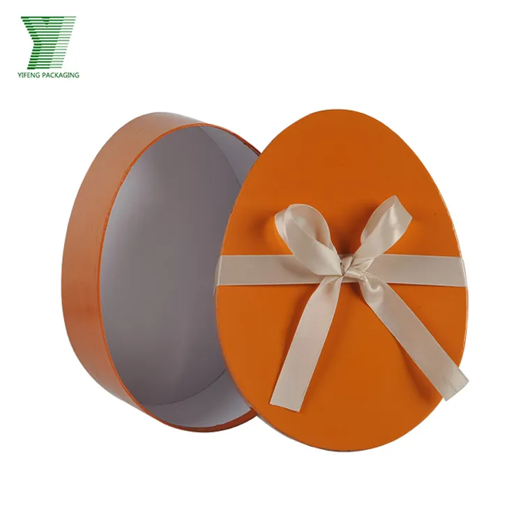 Caja de embalaje ovalada decorativa con tapa e inferior para chocolate, cartón personalizado de dos piezas con forma de huevo con cinta