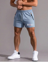 Short de gymnastique athlétique pour hommes Pantalon de sport d'été décontracté avec poches zippées Short de course pour hommes Short de gymnastique pour hommes de 5 pouces avec doublure