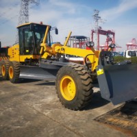 Niveleuse GR215 à moteur 215 CV pour travaux de réparation de routes en gravier, équipée d'une lame durable pour le façonnage du terrain