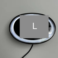 Emblème de calandre LED dynamique à effet de poursuite en acrylique noir chromé, autocollant de voiture pour LC250 LC200 LC300 LX470 LX570, badge de calandre avant