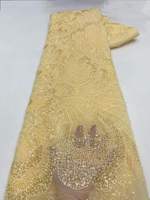 Tissu en dentelle brodée de luxe à fleurs 100 % polyester de haute qualité du Guangdong avec perles et sequins