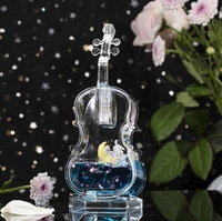 Astronaute créatif avec lanterne et violon, jouet de sable mouvant pour enfants avec dessin animé de gouttelettes d'huile flottantes, pièce de décoration de table