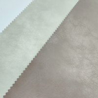 Tissu en polyester enduit de PU noir imperméable de bonne qualité à prix abordable, avec support tricoté, anti-moisissure et résistant à l'abrasion pour vestes