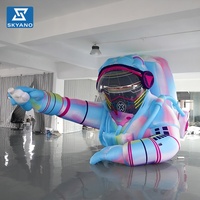 Modèle d'installation artistique géante gonflable personnalisée d'un astronaute pour la décoration publicitaire d'événements extérieurs sur le thème de l'espace universel