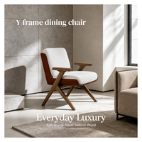 Fauteuil simple en bouclette de qualité supérieure avec structure en bois de frêne massif, revêtement en cuir et accoudoirs en bois pour salon.