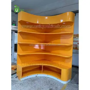 Curved candy wall display stands modern candy store furniture wall cabinet corner showcase shelf with lighting for sale