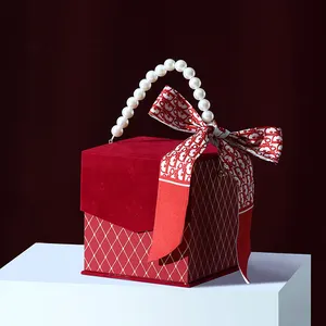 Competitive price paper storage box children's clothing packaging red garment wedding dress socks gift case with pearl handle
