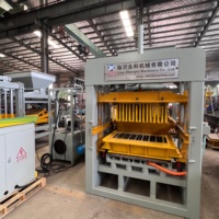 Machine à mouler des blocs de béton QT4-15 pour la production de briques creuses et de blocs pleins
