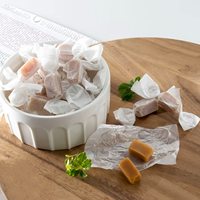 Vente en gros Papier d'emballage pour chocolat et caramel Papier d'emballage pour sucre sulfurisé enduit de silicone avec logo