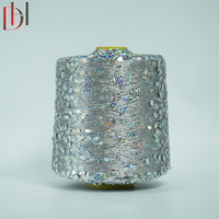 Décoration de vêtements à paillettes en forme de gouttelettes d'argent de haute qualité avec usine de tissu de fil fantaisie