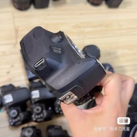 529 USD Canon EOS 850D Orijinal İkinci El Dijital SLR Fotoğraf Makinesi, pil ve pil şarj cihazı ile, İyi Durumda