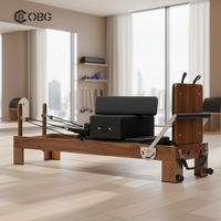 Machine de Pilates Reformer en bois de noyer de luxe pour la rééducation, la physiothérapie, équipement de studio de Pilates