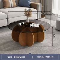 Table basse moderne convertible avec plateau en verre rond, base en piédestal cannelé, finition blanche, table d'appoint pour salon, meubles pour petits espaces