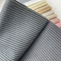 Tissu de canapé de luxe textile pour la nouvelle mode Matière première confortable en velours côtelé Tissu d'ameublement en velours côtelé uni en polyester pour canapé
