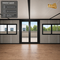 Maison conteneur de luxe extensible de 40 pieds, à aile unique, extérieur blanc, intérieur en panneaux de cristal de carbone, pour projet de villa ou de complexe hôtelier