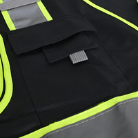 Veste de travail réfléchissante multi-poches ULTAC, personnalisable avec logo LED, haute visibilité, noire, en polyester, gilet de sécurité