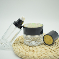 Crème de soin de la peau promotionnelle de haute qualité bouteilles en verre transparent pot de crème en verre avec couvercle noir