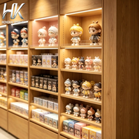 Vitrine de présentation en bois moderne et écologique avec éclairage LED, étagère murale et comptoir central pour boutique de jouets