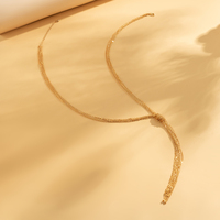 Colliers à chaîne pour femmes sexy multi-couches avec pompon noué, accessoires de chaîne de poitrine pour femmes tendance 2025