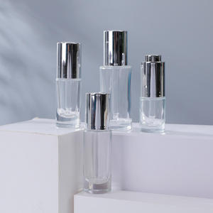 Flacon de lotion en verre transparent haut de gamme avec tête de pompe à pression 20ml/100ml, diffuseur à bâtonnets pour <span class=keywords><strong>essence</strong></span> faciale de luxe, crème pour le visage, <span class=keywords><strong>mascara</strong></span> - Product Image 1
