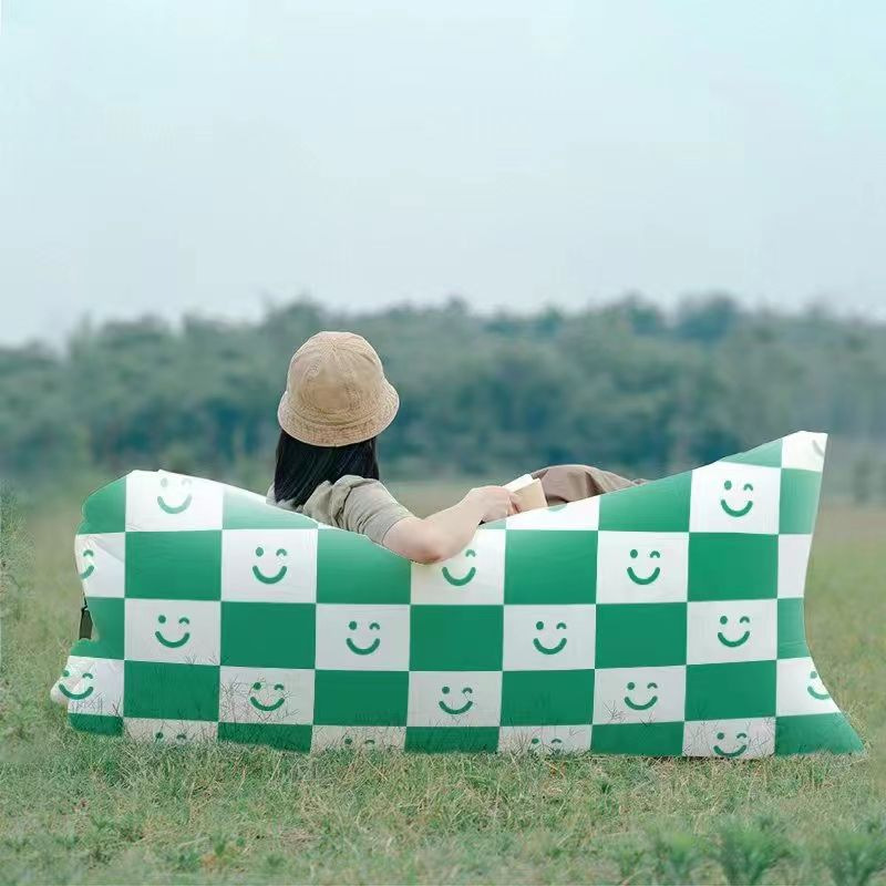 Green smiley face pointed head