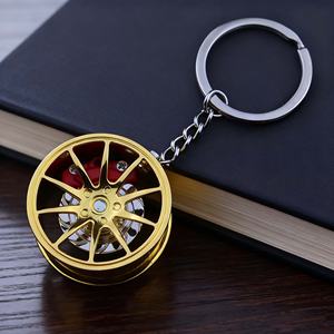 พวงกุญแจโลหะหมุนได้แบบขายส่ง สำหรับโปรโมชั่น ตกแต่งด้วยล้อดูดซับแรงกระแทก รูปทรงเทอร์โบรถยนต์ เหมาะสำหรับเป็นของขวัญ - Product Image 4